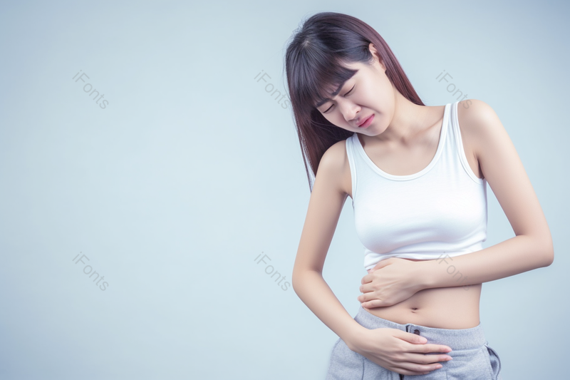 蓝色摄影图居家的女人表现胃痛的表情,高清,摄影图,摄影图片,图片大全,摄影图免费下载